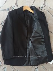 Новый качественный пиджак черного цвета по отличной цене