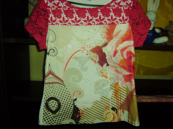 Шикарная кофточка футболка в состоянии новой