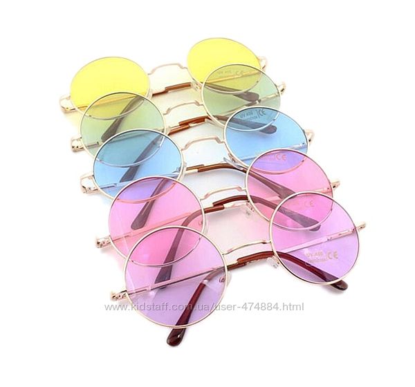 Круглые очки от солнца с тонкой металлической оправой и цветной линзой