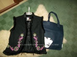 Шикарная жилетка, очень красивая.