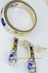 Золотые серьги и кольцо с бриллиантами и сапфирами