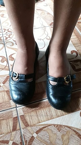 Чёрные кожаные туфли