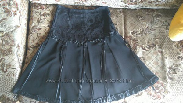 Черная красивая женская юбка миди расклешенная