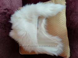 Мила теплюща зимова шапка