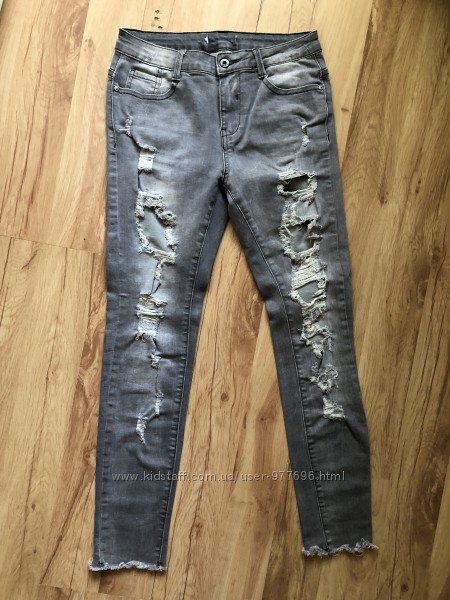 Крутые узкие рваные джинсы jeans на высокой посадке дешево