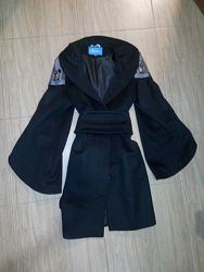 Элегантное осеннее пальто