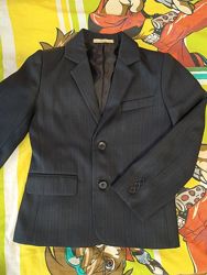 піджак темно сірого кольору в дрібну смужку 10-12 років